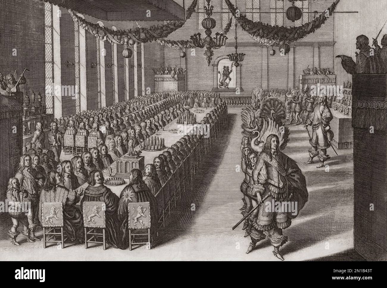 A 17th century banquet.  This official dinner celebrated the signing of the Peace of Westphalia, September 25, 1649.  It was held in Nuremberg, Germany.   A line of waiters, on the right, are bringing in dishes featuring various birds.  After a contemporary print. Stock Photo