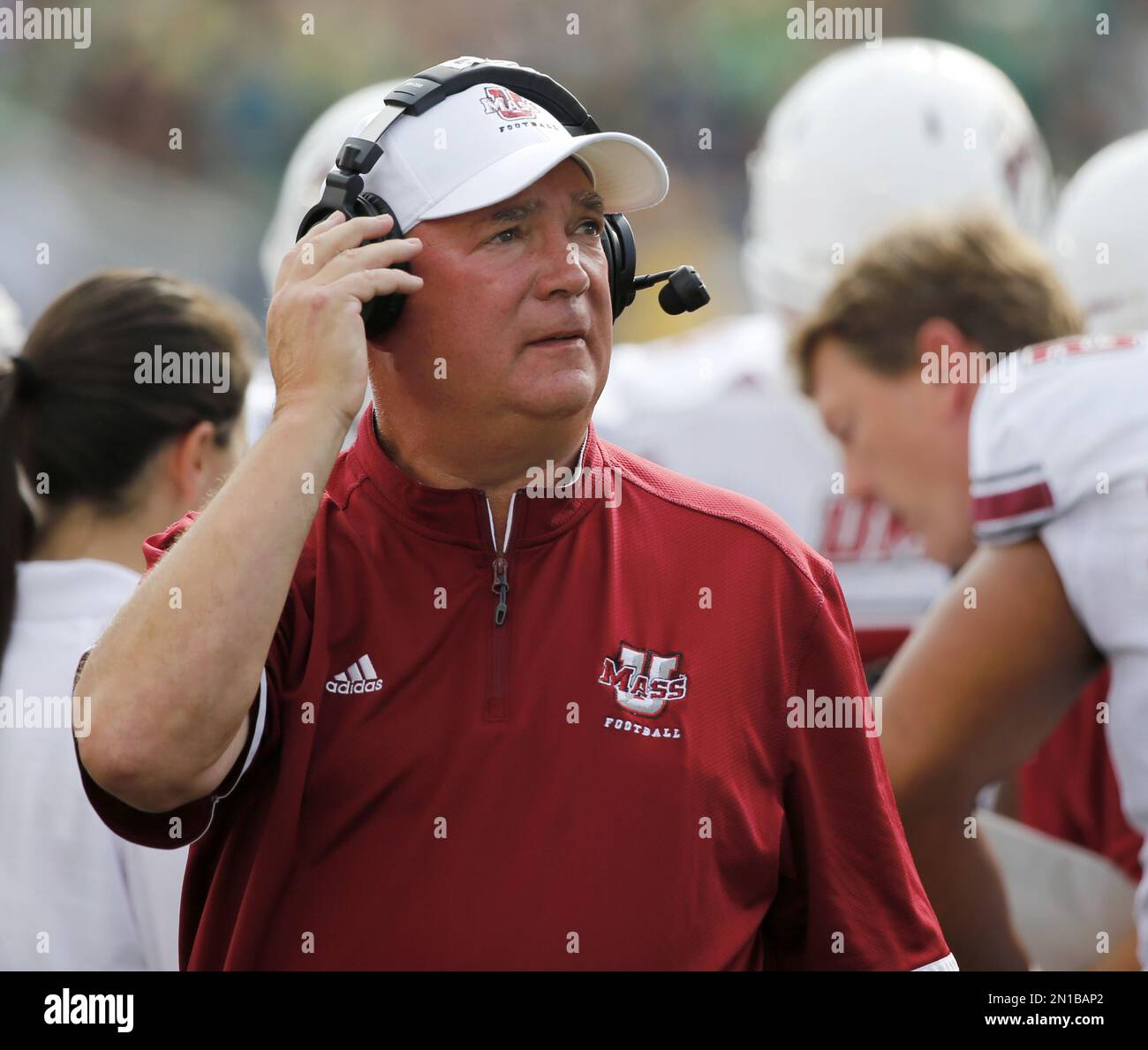 Massachusetts head coach Mark Whipple looks at the scoreboard during