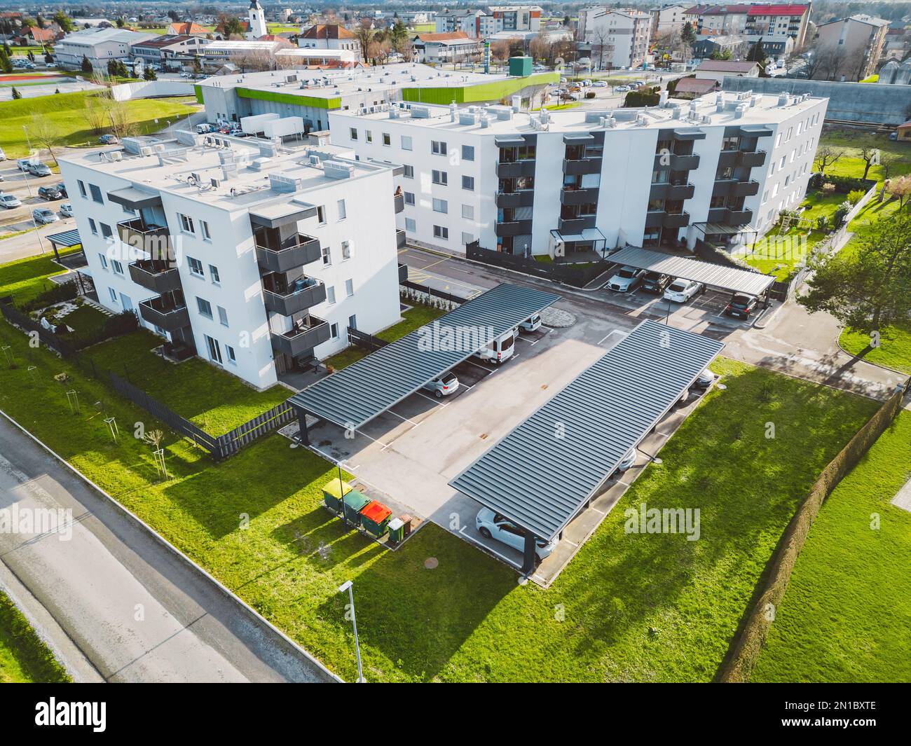Two new residential buildings with covered parking spaces Stock Photo ...
