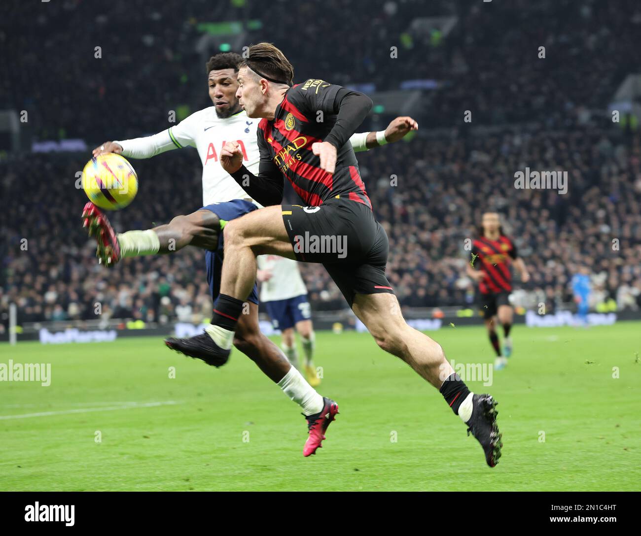 Manchester City's Jack Grealish takes on Tottenham Hotspur's Emerson Royal during the English Premier League soccer match between Tottenham Hotspur an Stock Photo