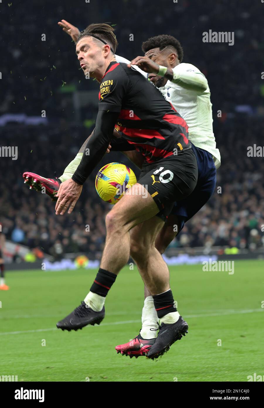 Manchester City's Jack Grealish takes on Tottenham Hotspur's Emerson Royal during the English Premier League soccer match between Tottenham Hotspur an Stock Photo