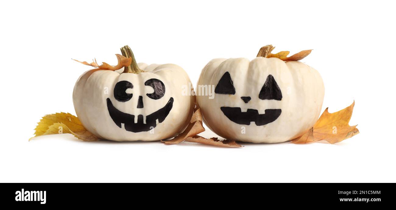 Cute Halloween pumpkins and autumn leaves on white background Stock ...