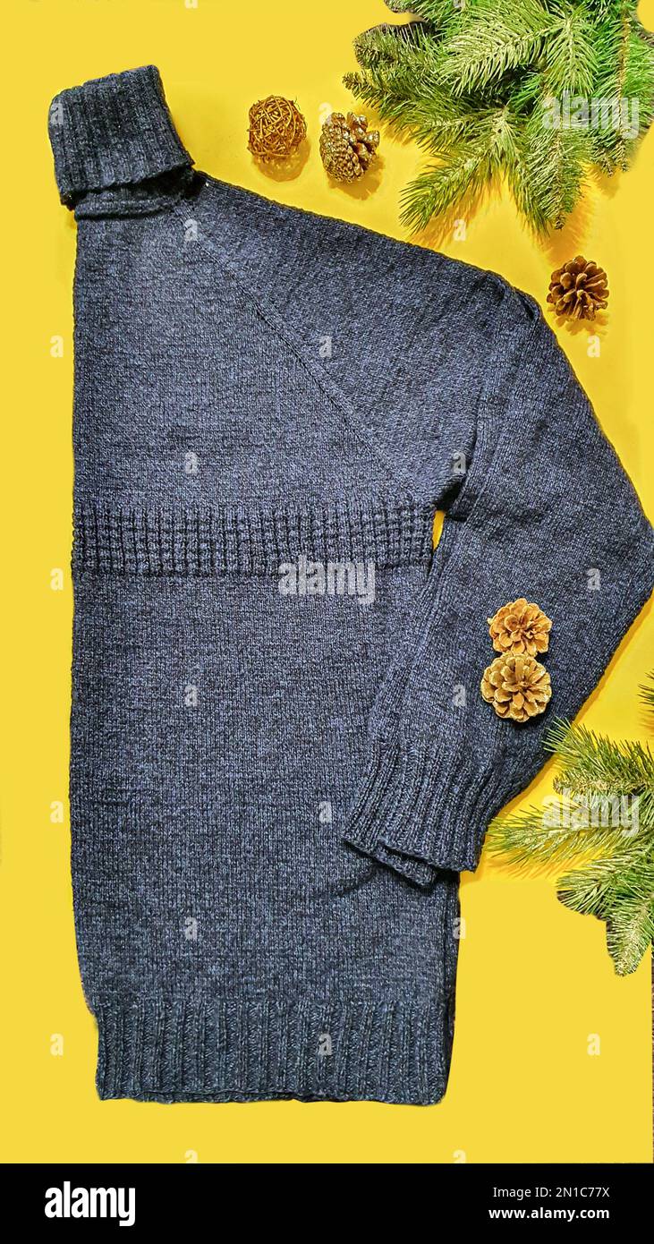 Knitted handmade items. Knitted fabric from colored thread. Bright background. copy space Stock Photo