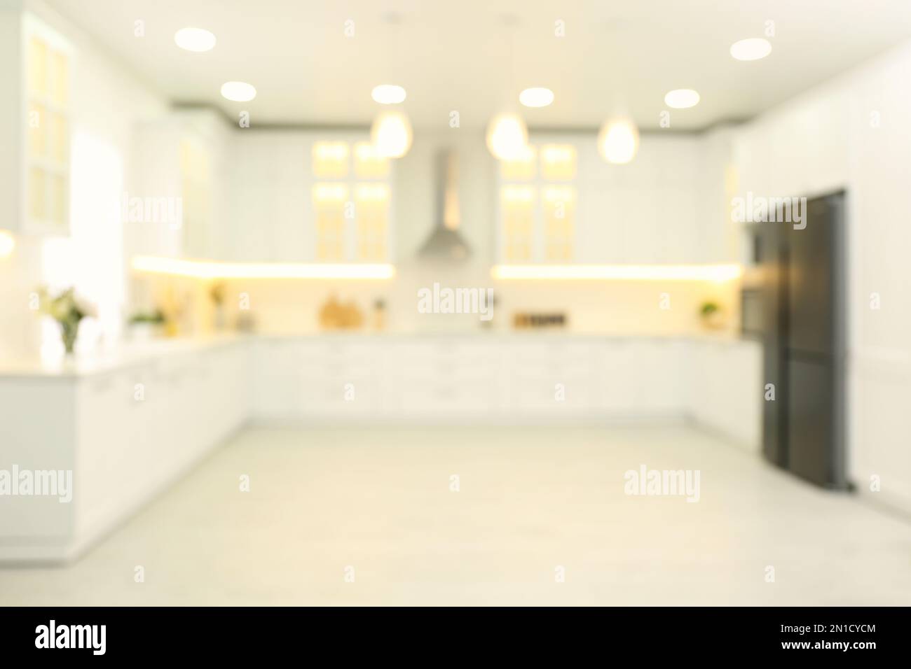 Blurred view of modern kitchen interior with stylish furniture Stock ...