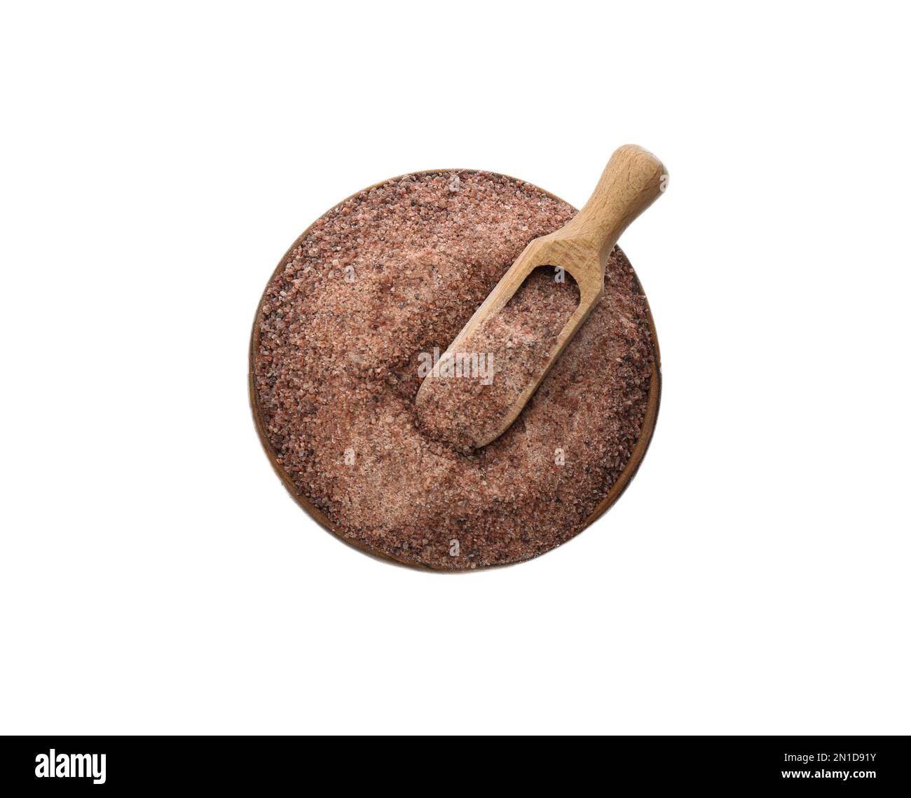 Ground black salt in bowl with scoop isolated on white, top view Stock Photo