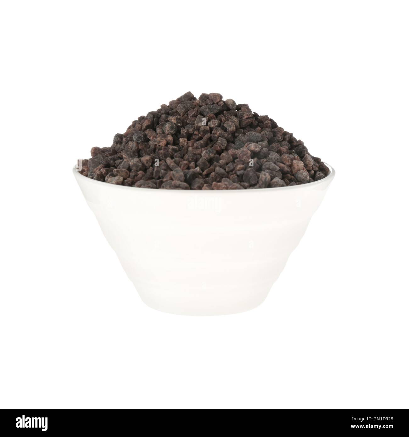 Black salt in ceramic bowl isolated on white Stock Photo