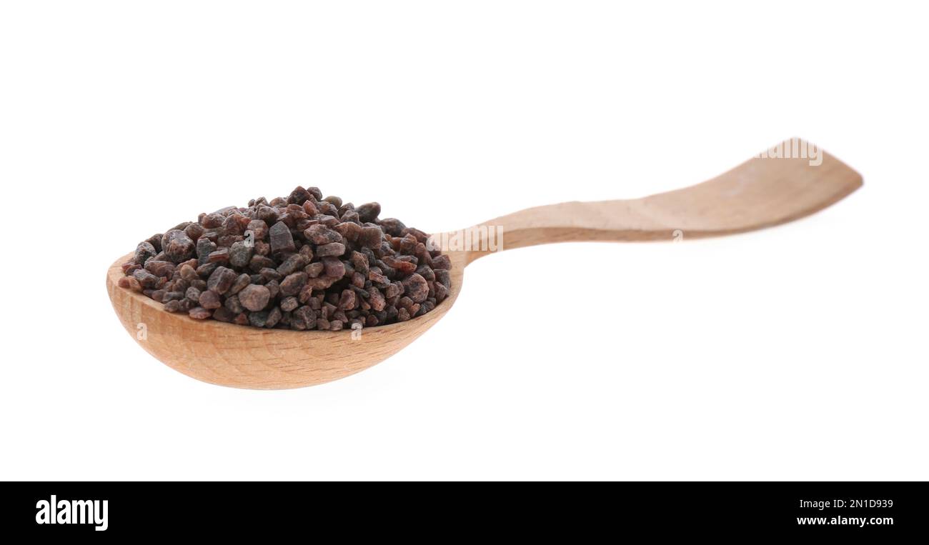 Black salt in wooden spoon isolated on white Stock Photo