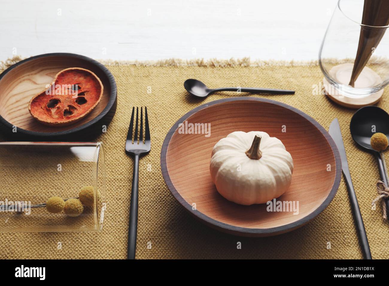 Autumn table setting with pumpkin on white background Stock Photo - Alamy