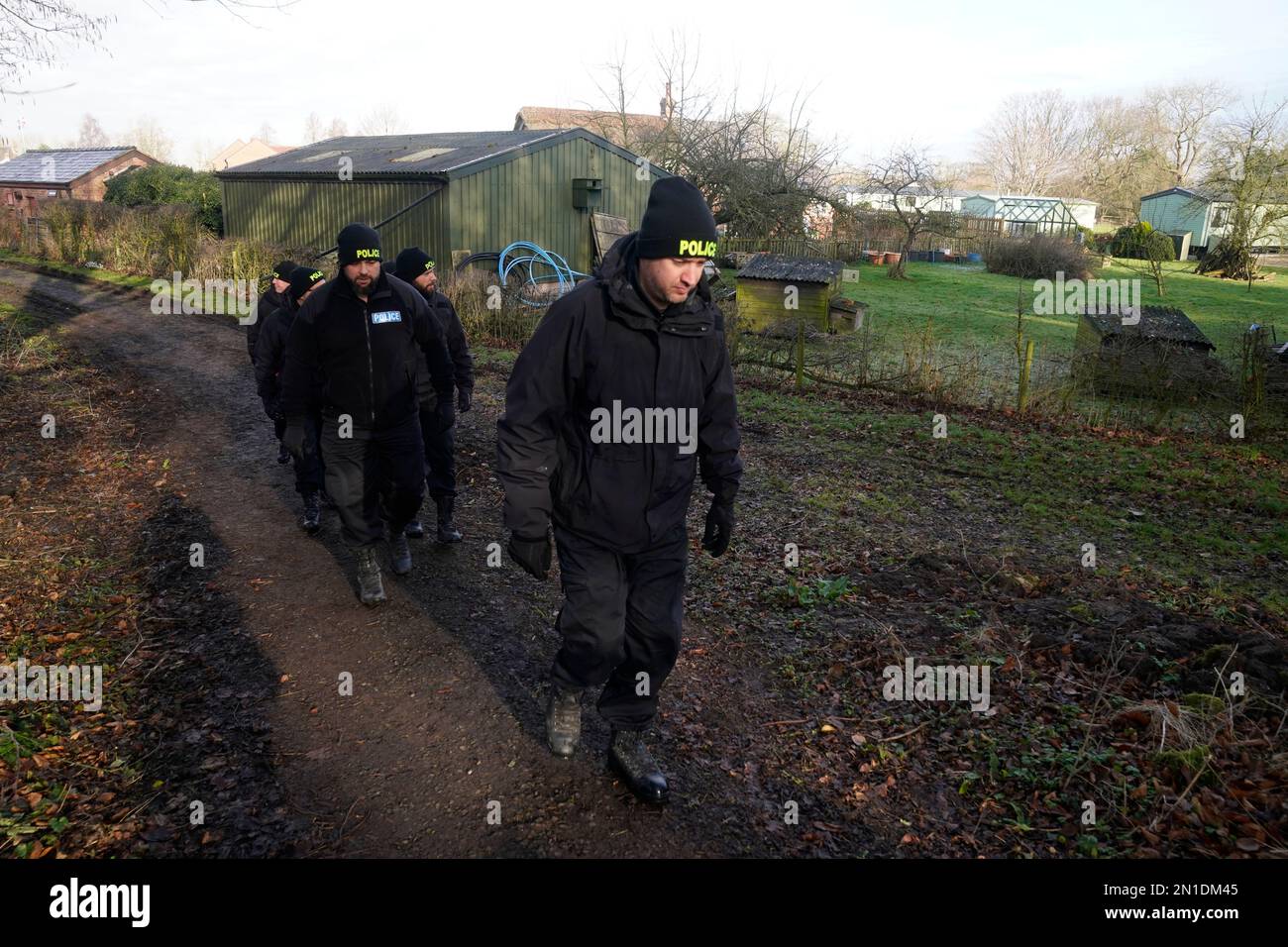 Police officers in St Michael's on Wyre, Lancashire, as the search for missing woman Nicola Bulley, 45, who was last seen on the morning of Friday January 27, when she was spotted walking her dog on a footpath by the nearby River Wyre. Picture date: Monday February 6, 2023. Stock Photo