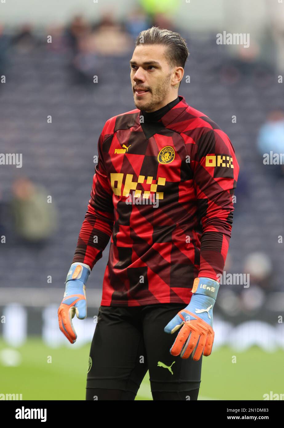 Manchester City's  Ederson during the pre-match warm-up  during the English Premier League soccer match between Tottenham Hotspur and Manchester City Stock Photo