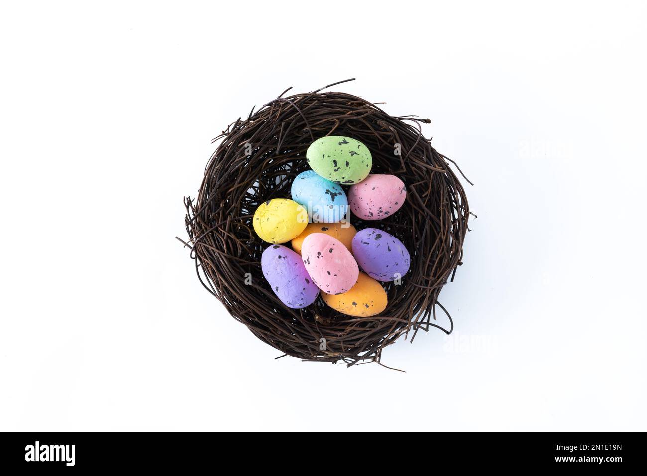 Colorful Easter eggs inside a nest isolated on white background Stock ...