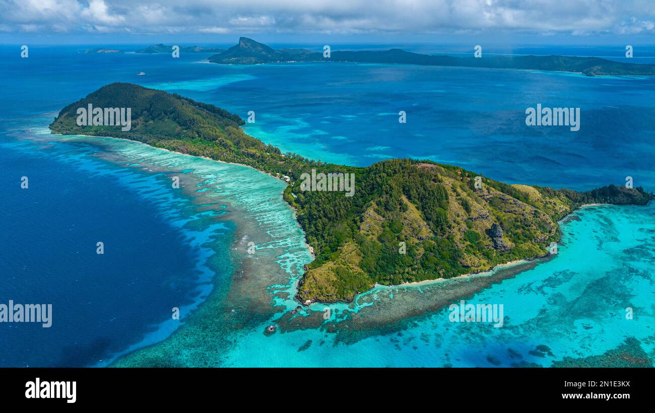 Aerial over Aukena island, Gambier archipelago, French Polynesia, South
