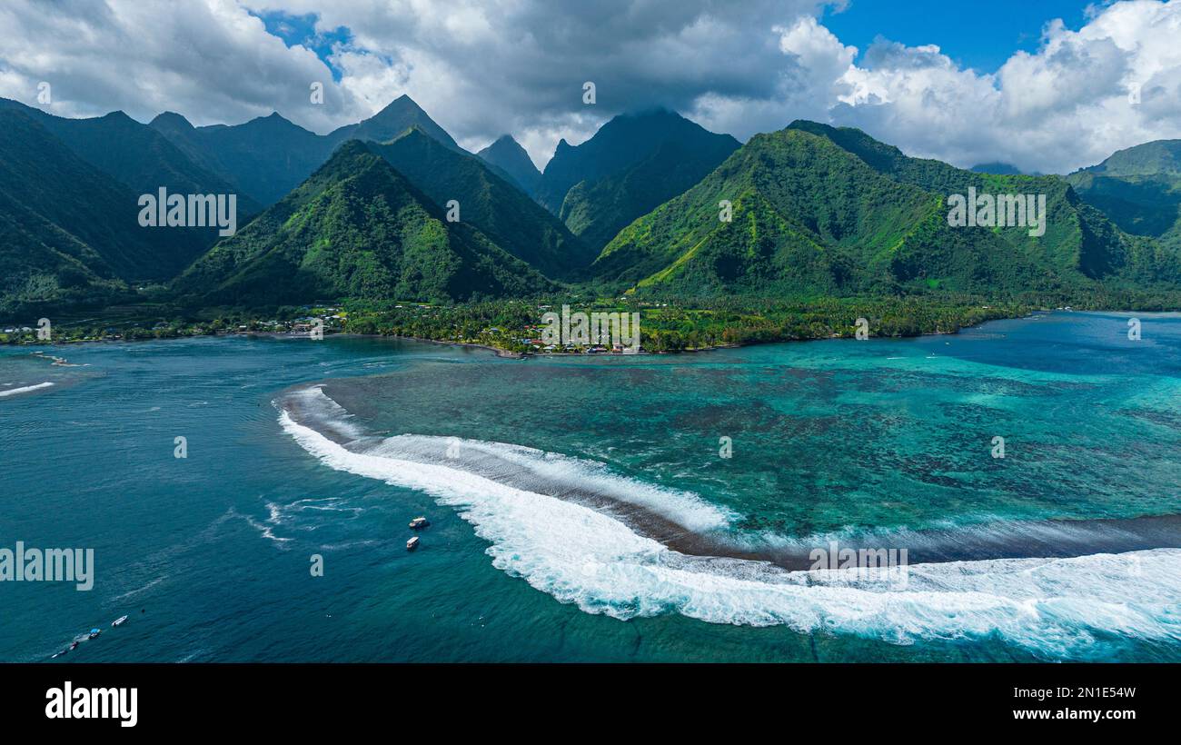 Aerial of Teahupoo wave and Tahiti Iti, Society Islands, French Polynesia, South Pacific