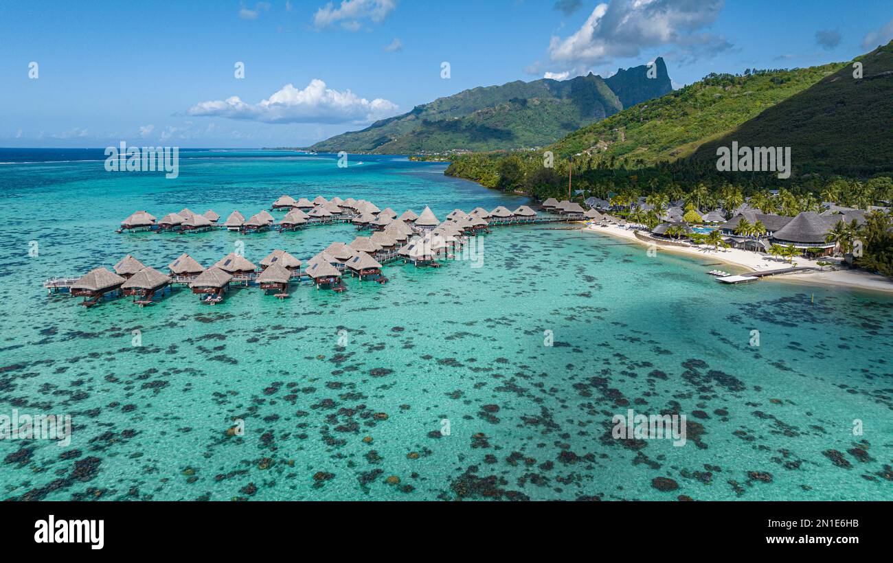 Aerial of overwater bungalows in the lagoon of Moorea (Mo'orea), Society Islands, French Polynesia, South Pacific, Pacific Stock Photo