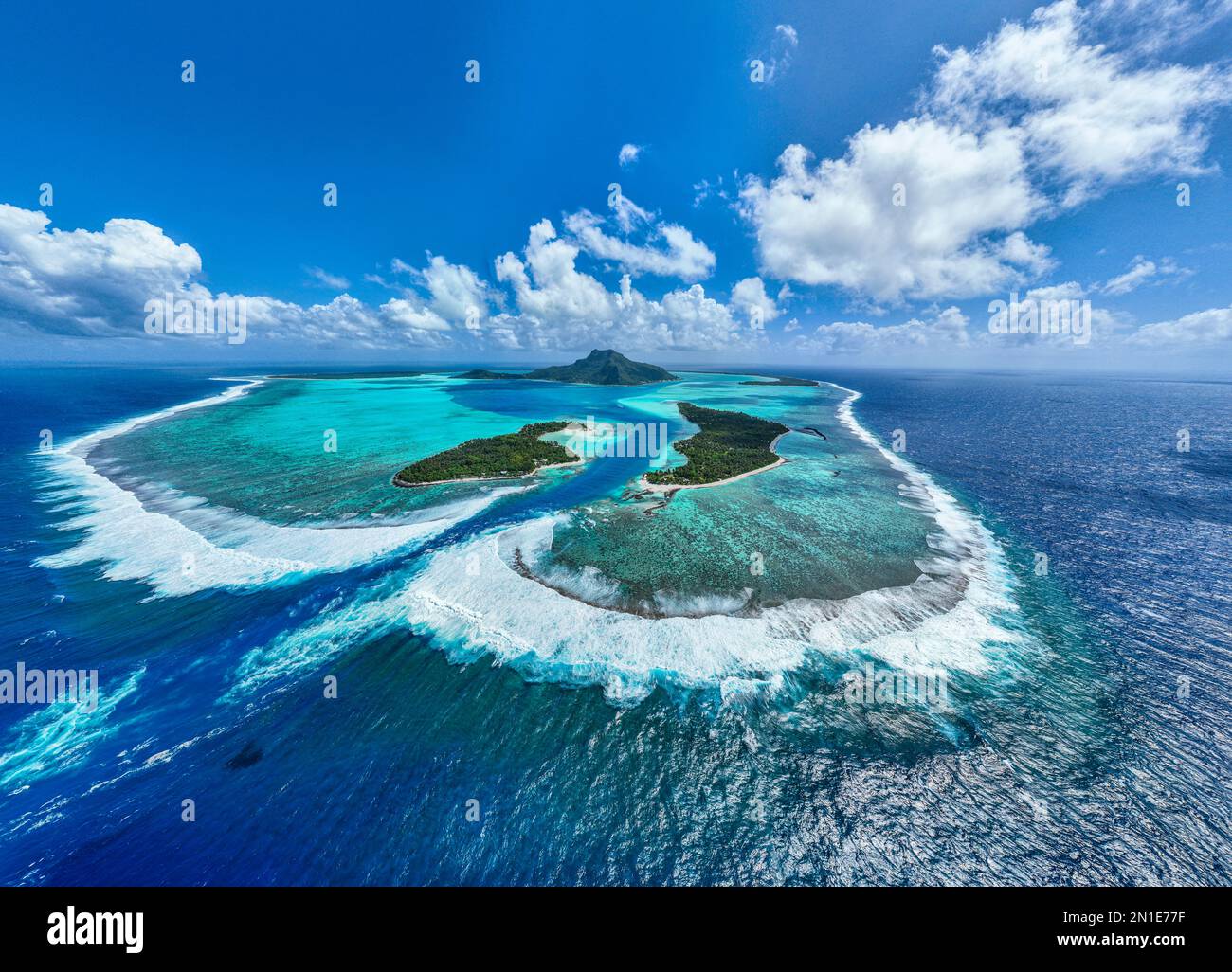 Aerial of the lagoon of Maupiti island, Society Islands, French Polynesia, South Pacific, Pacific Stock Photo