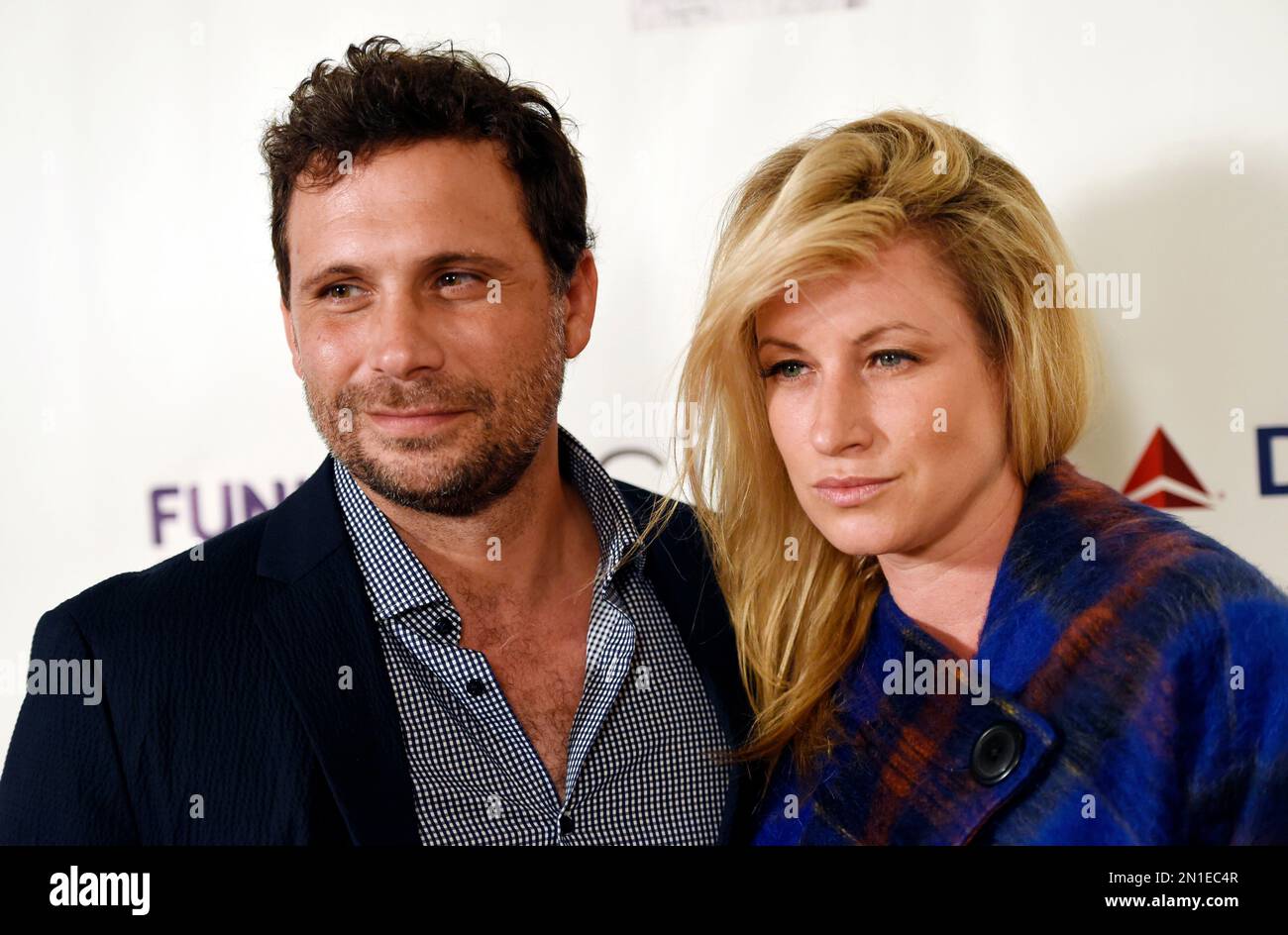 Judge Jeremy Sisto, left, and his wife Addie Lane pose together at the