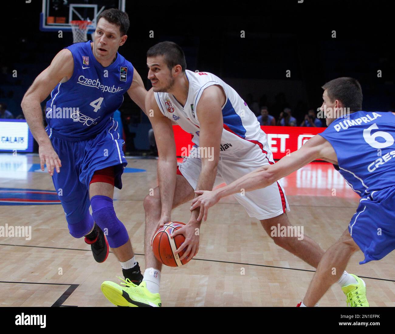 Pavel Pumprla of Czech Republic, left, and Andrew Albicy of France fight  for a ball during the qualification match for the Basketball World Cup 2019  Czech Republic vs France in Pardubice, Czech