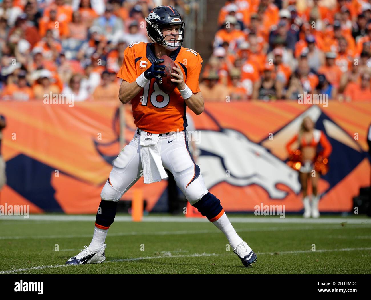 Denver Broncos quarterback Peyton Manning drops back to pass against ...