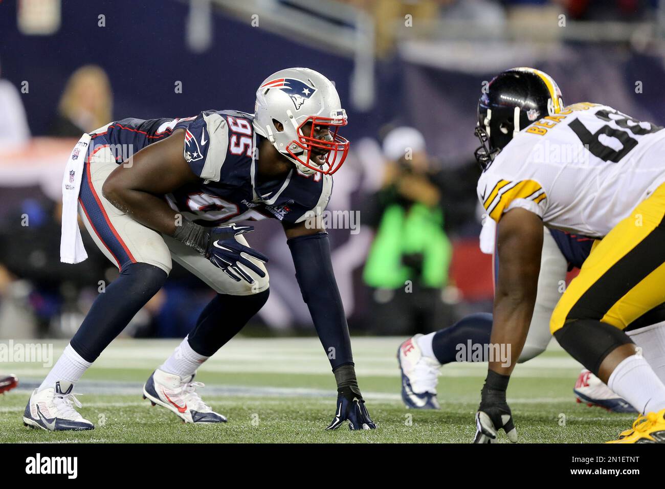 New England Patriots Chandler Jones #95 is seen against the Pittsburgh Steelers during an NFL football game, Thursday, Sept. 10, 2015, in Foxborough, Mass. (AP Photo/Gregory Payan) Stock Photo