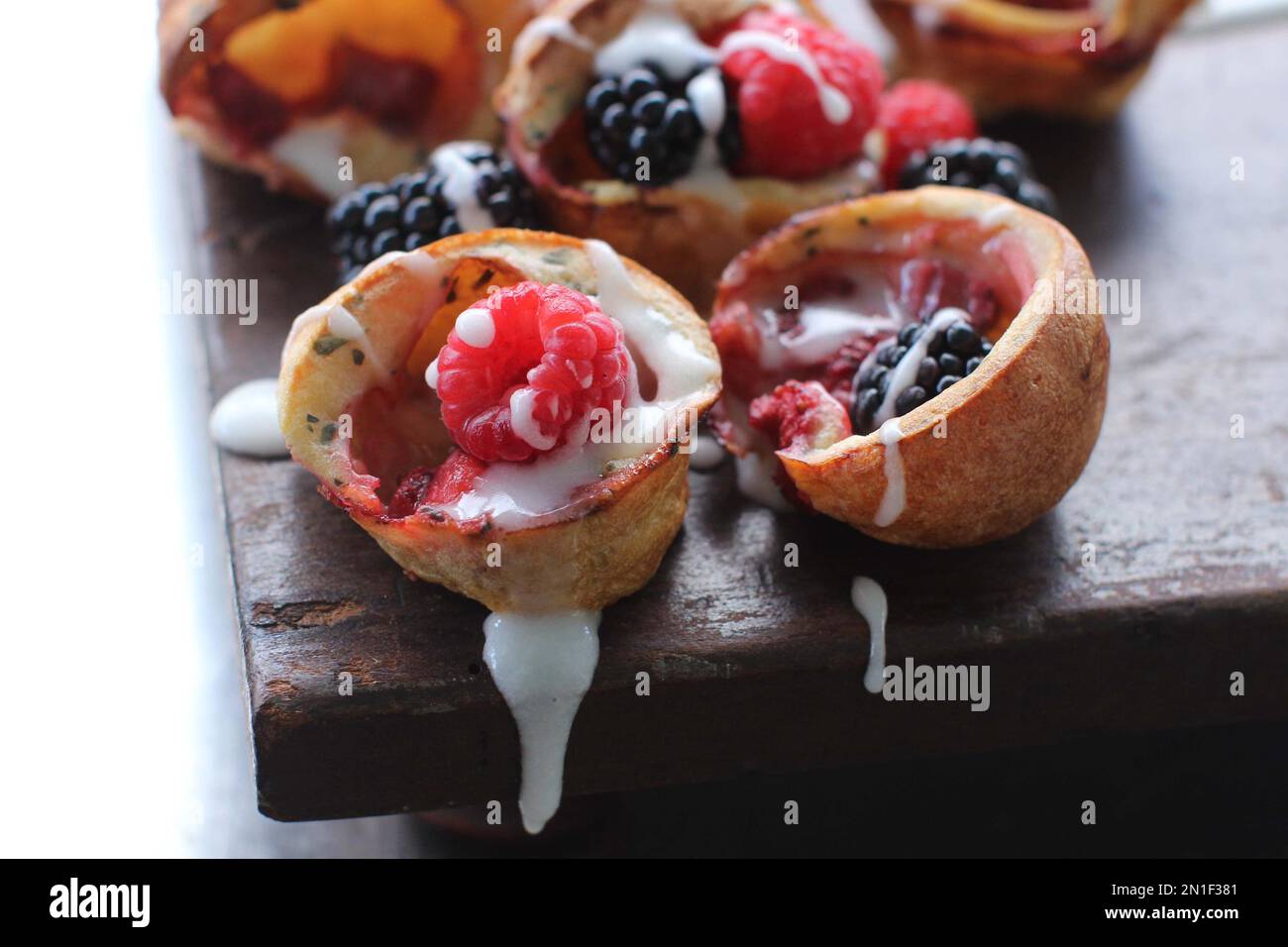 This Sept. 14, 2015 photo shows mini strawberry popovers in Concord, NH