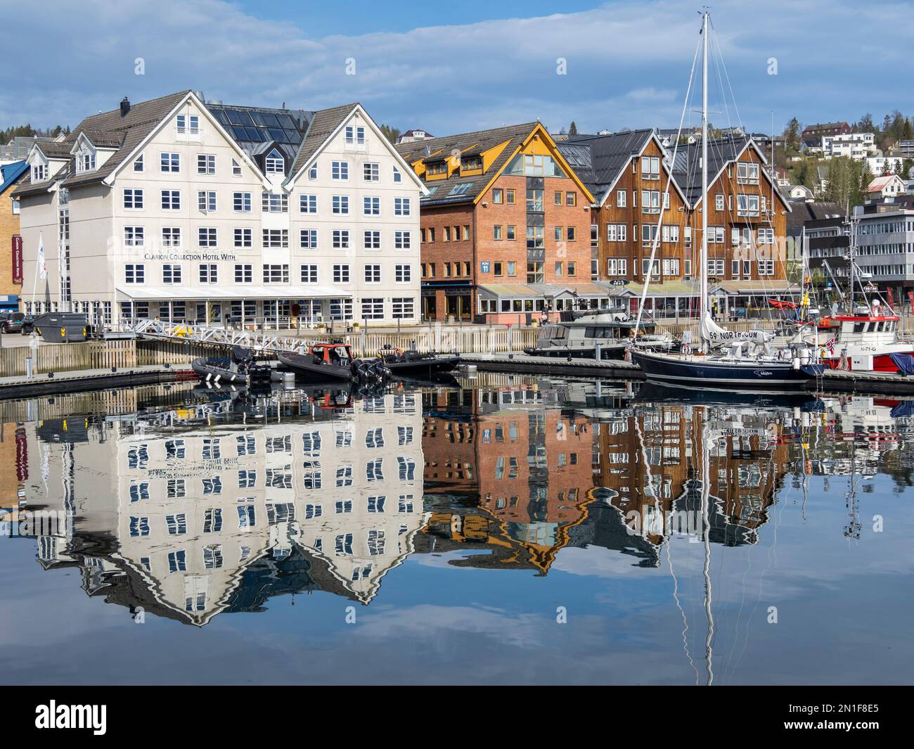 A view of the water front in the city of Tromso, located 217 miles north of the Arctic Circle, Tromso, Norway, Scandinavia, Europe Stock Photo