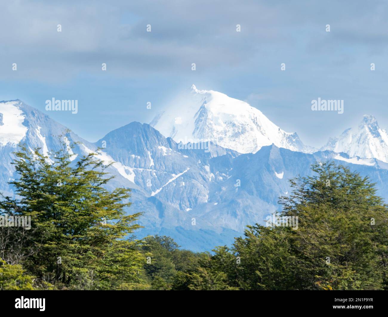 View of the Andes Mountains and Notofagus forest in Lapataya Bay, Tierra del Fuego, Argentina, South America Stock Photo
