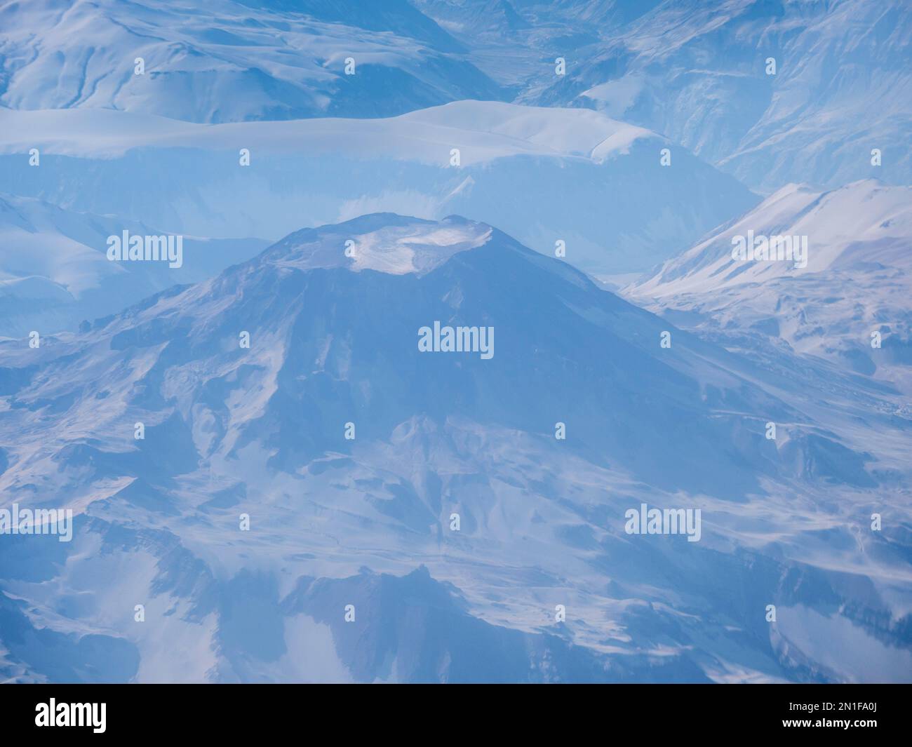 View of the Andes Mountains on a commercial flight from Santiago to Ushuaia, Chile, South America Stock Photo