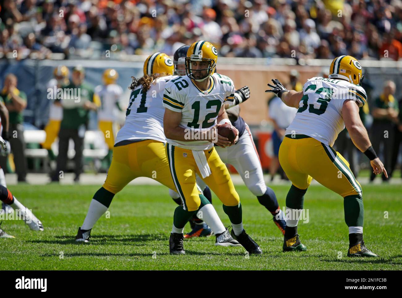 Green Bay Packers quarterback Aaron Rodgers (12) prepares to hand the ...