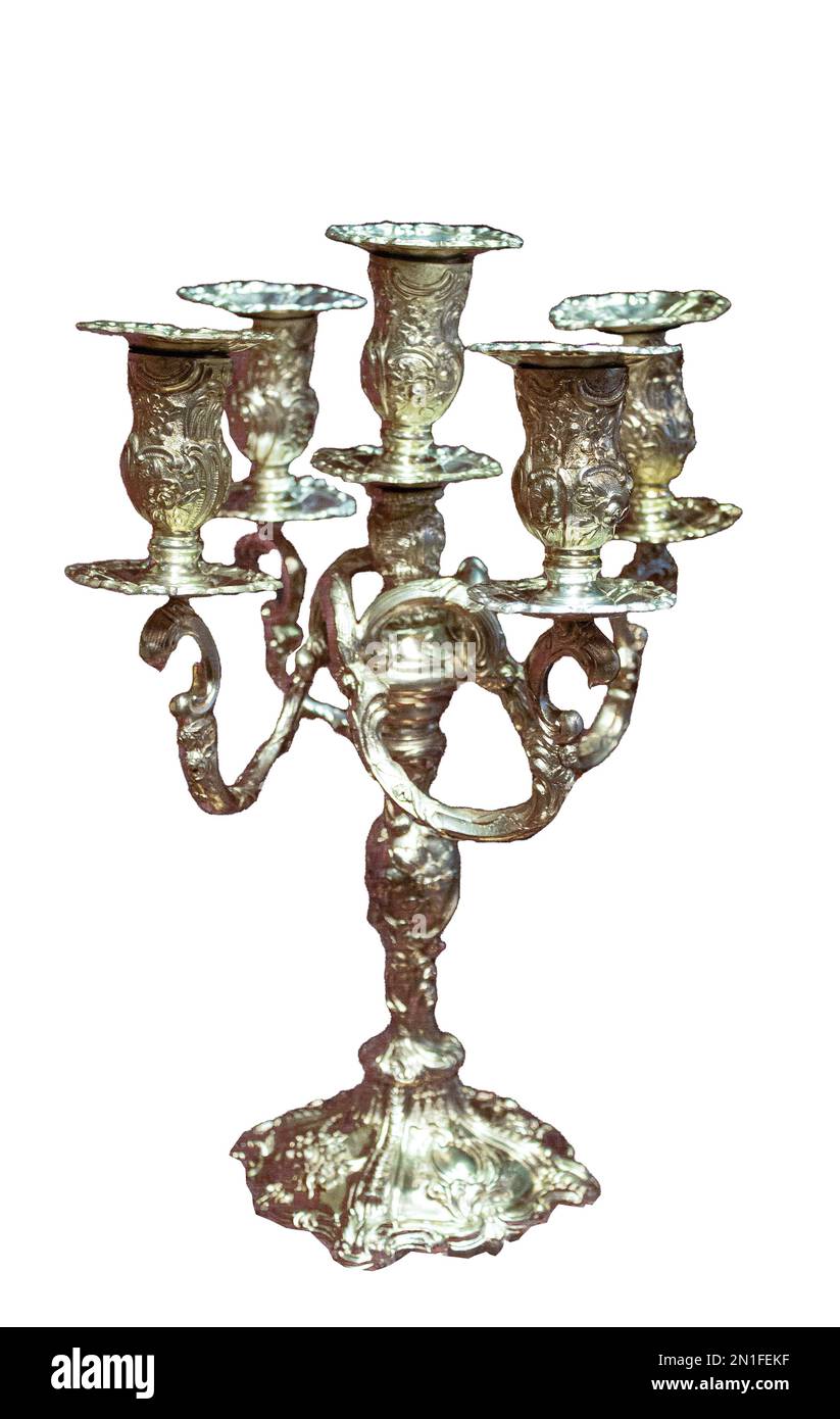 Old vintage silver chandelier for five candles. Metal retro candlestick