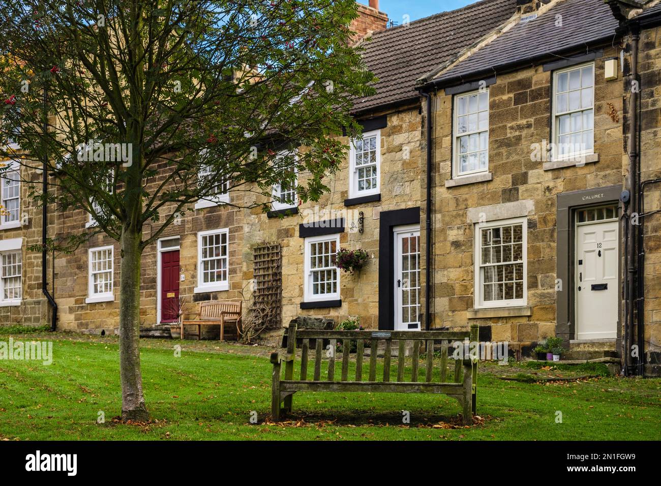 Old stone cottages on a village street in North York Moors National Park. Osmotherley, Northallerton, north Yorkshire, England, UK, Britain Stock Photo