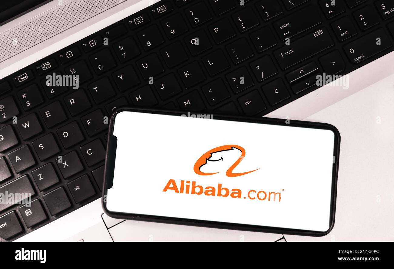 Modern ecommerce platform editorial background with alibaba app on mobile Stock Photo