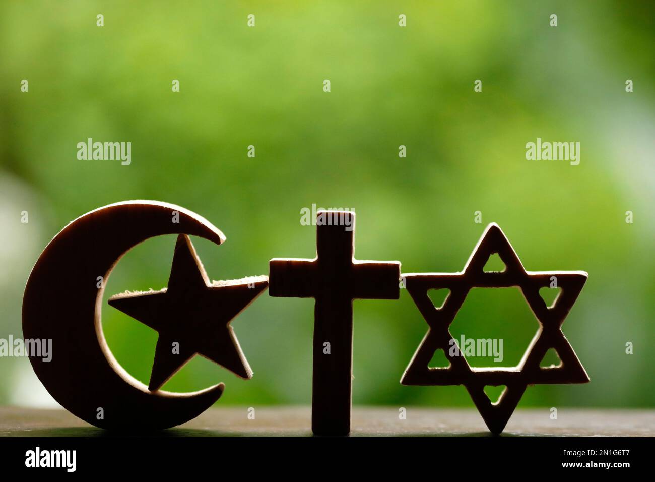 Religious symbols of Jewish Star of David, Muslim Star and Crescent, Christian Cross, interreligious and interfaith dialogue, Vietnam, Indochina, Sout Stock Photo