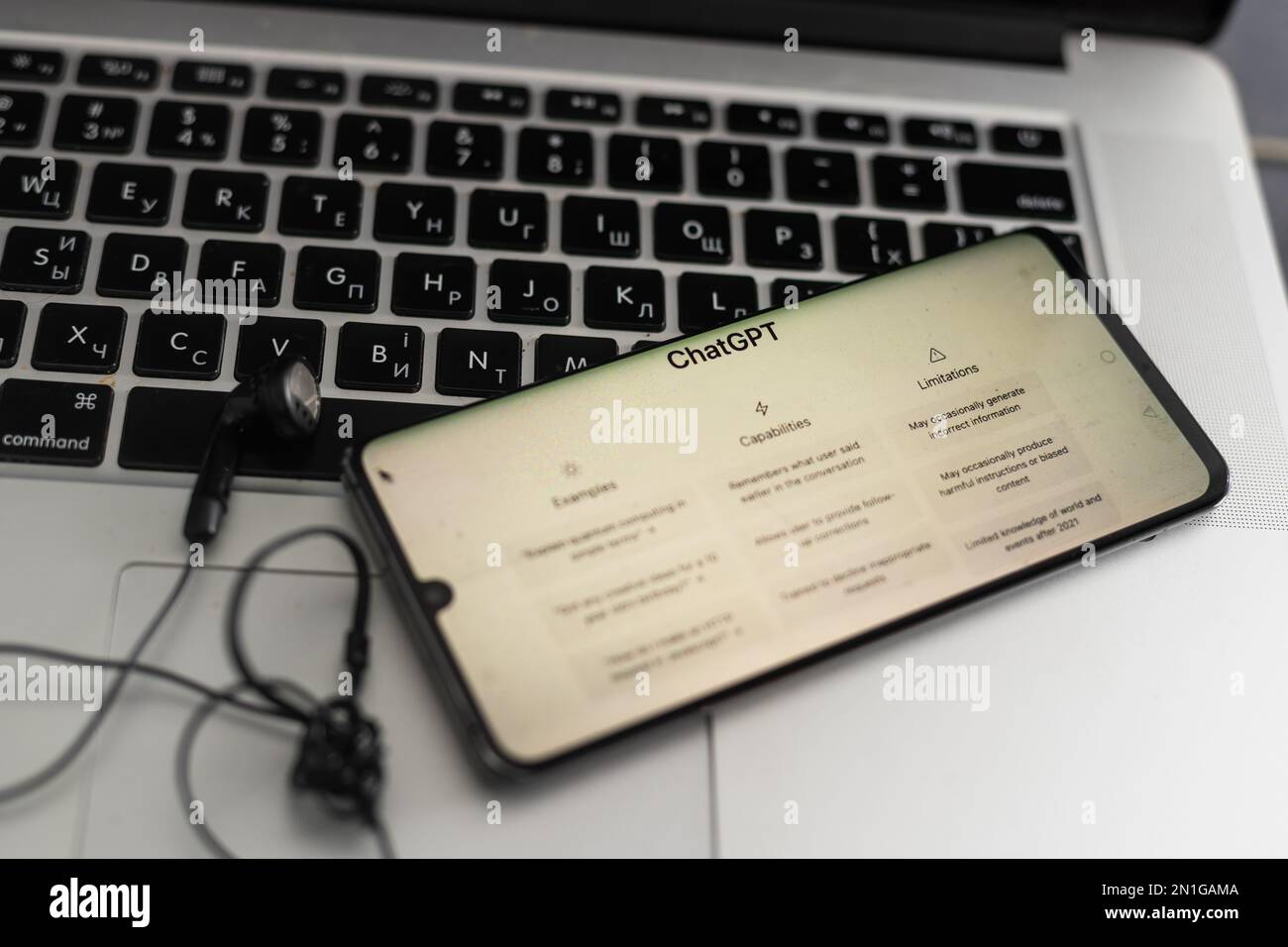 ChatGPT chat bot screen seen on smartphone and laptop display with Chat ...