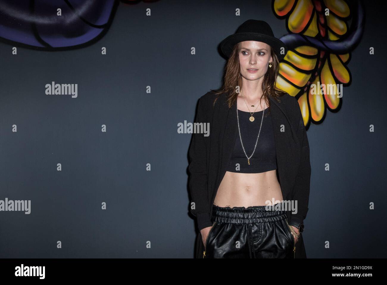 charlotte-de-carle-poses-for-photographers-upon-arrival-at-the-notion