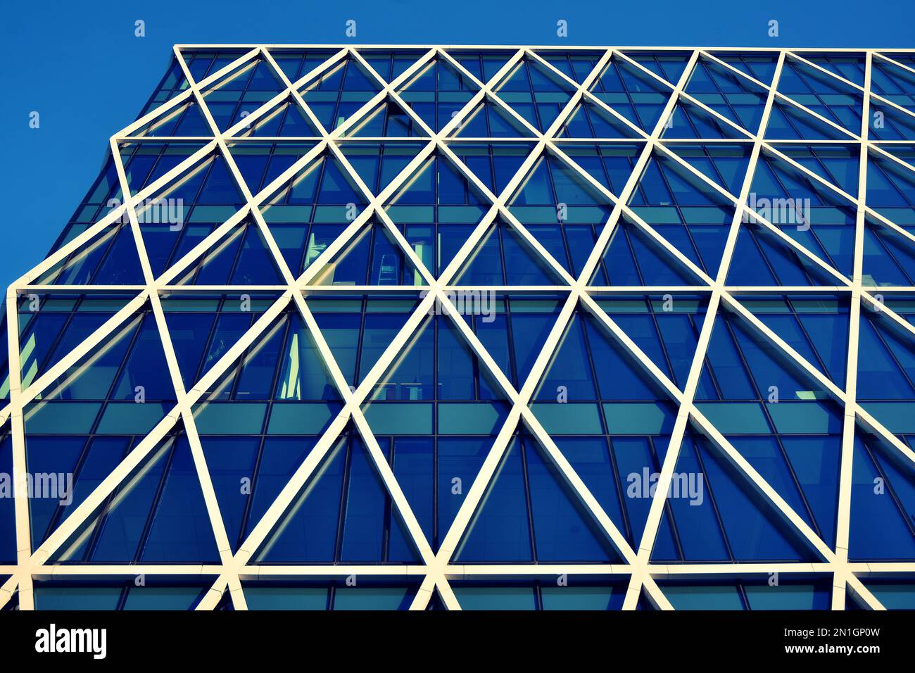 Modern office building on a clear sky background. Retro stylized ...