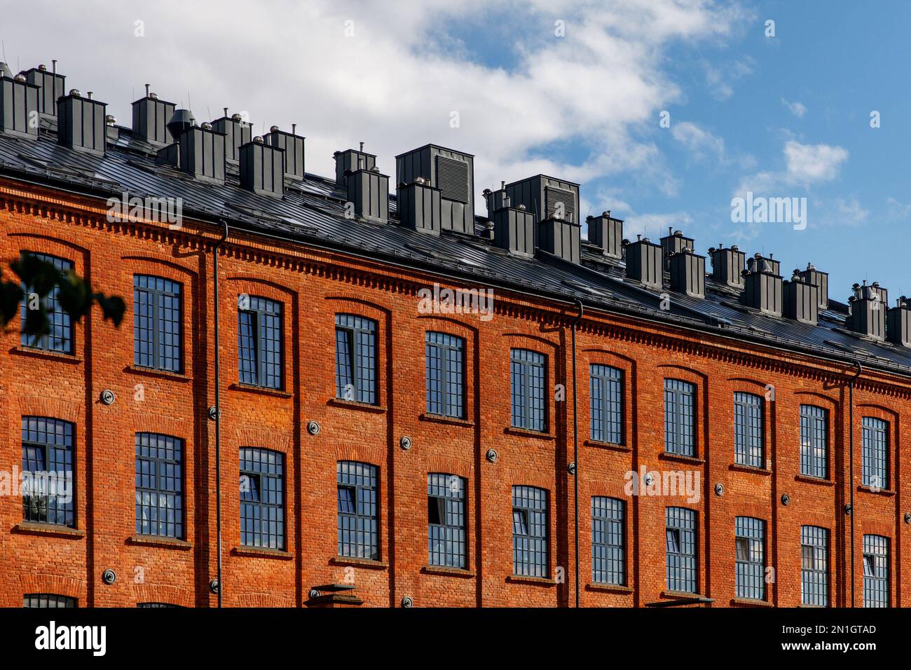 Red brick facade of the factory Stock Photo - Alamy