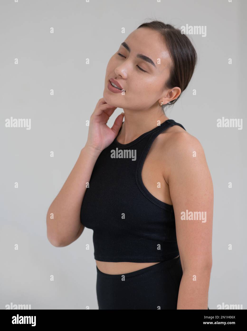 Portrait of a smiling Asian woman on a white background Stock Photo - Alamy