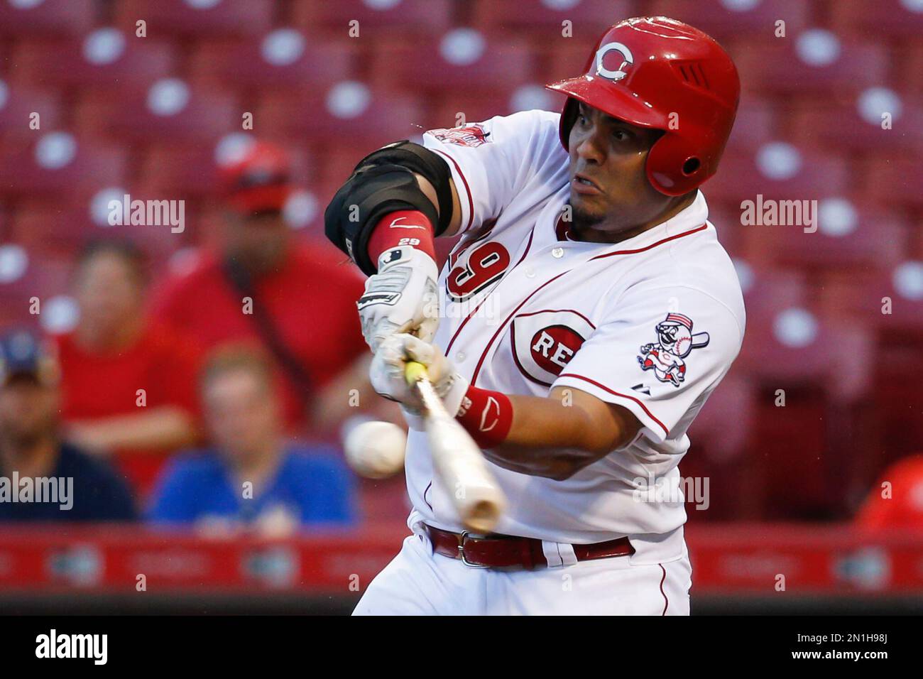 Cincinnati Reds catcher Brayan Pena hits a double to deep center in the ...