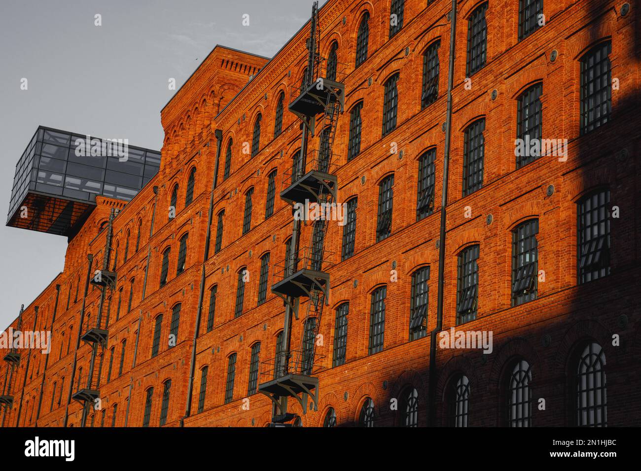 Red brick facade of the factory Stock Photo - Alamy