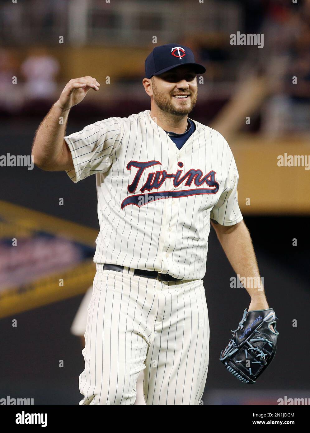 Minnesota Twins relief pitcher Kevin Jepsen celebrates the win and his