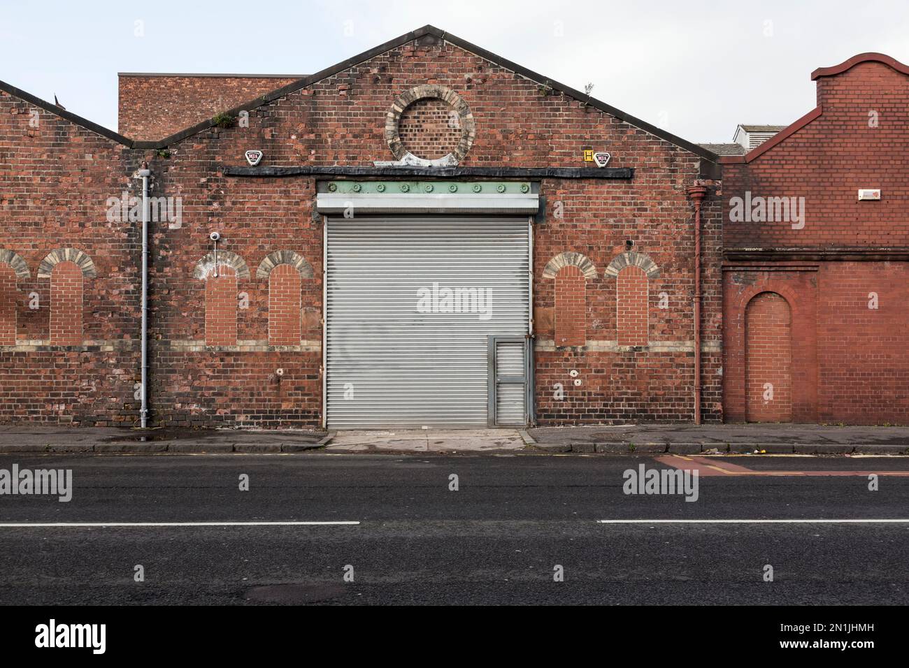 Exterior of an old industrial building with a brick facade, Glasgow