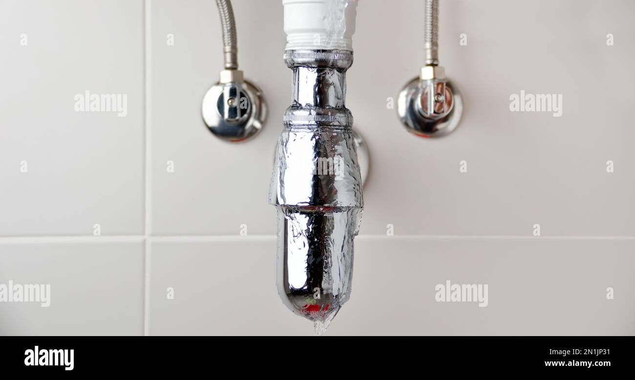 Water is leaking from the pipe Stock Photo Alamy