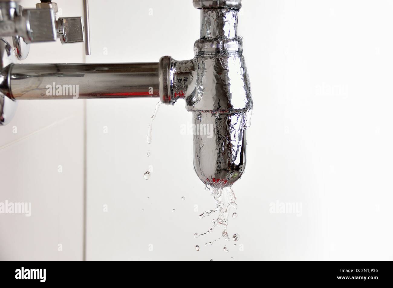 Water is leaking from the pipe Stock Photo Alamy