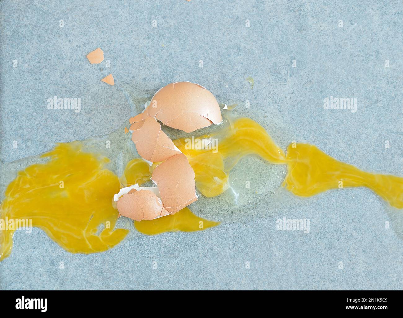 broken egg on the kitchen floor Stock Photo