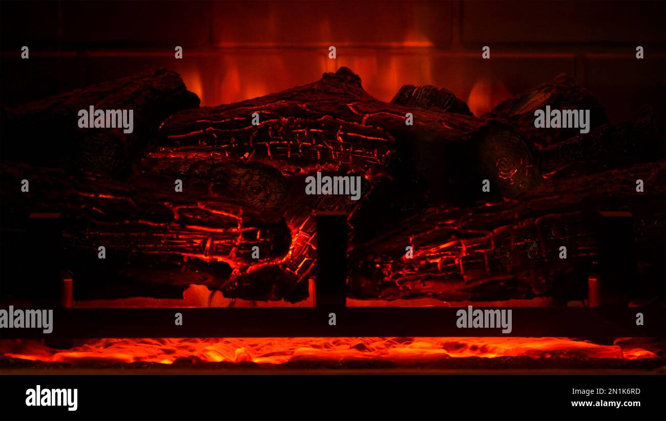 Burning fireplace in dark room hi-res stock photography and images - Alamy