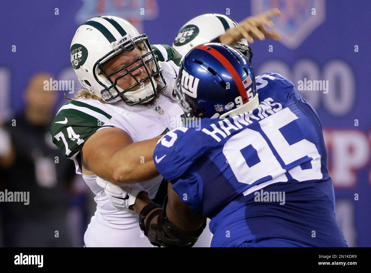 New York Jets center Nick Mangold (74) blocks New York Giants ...
