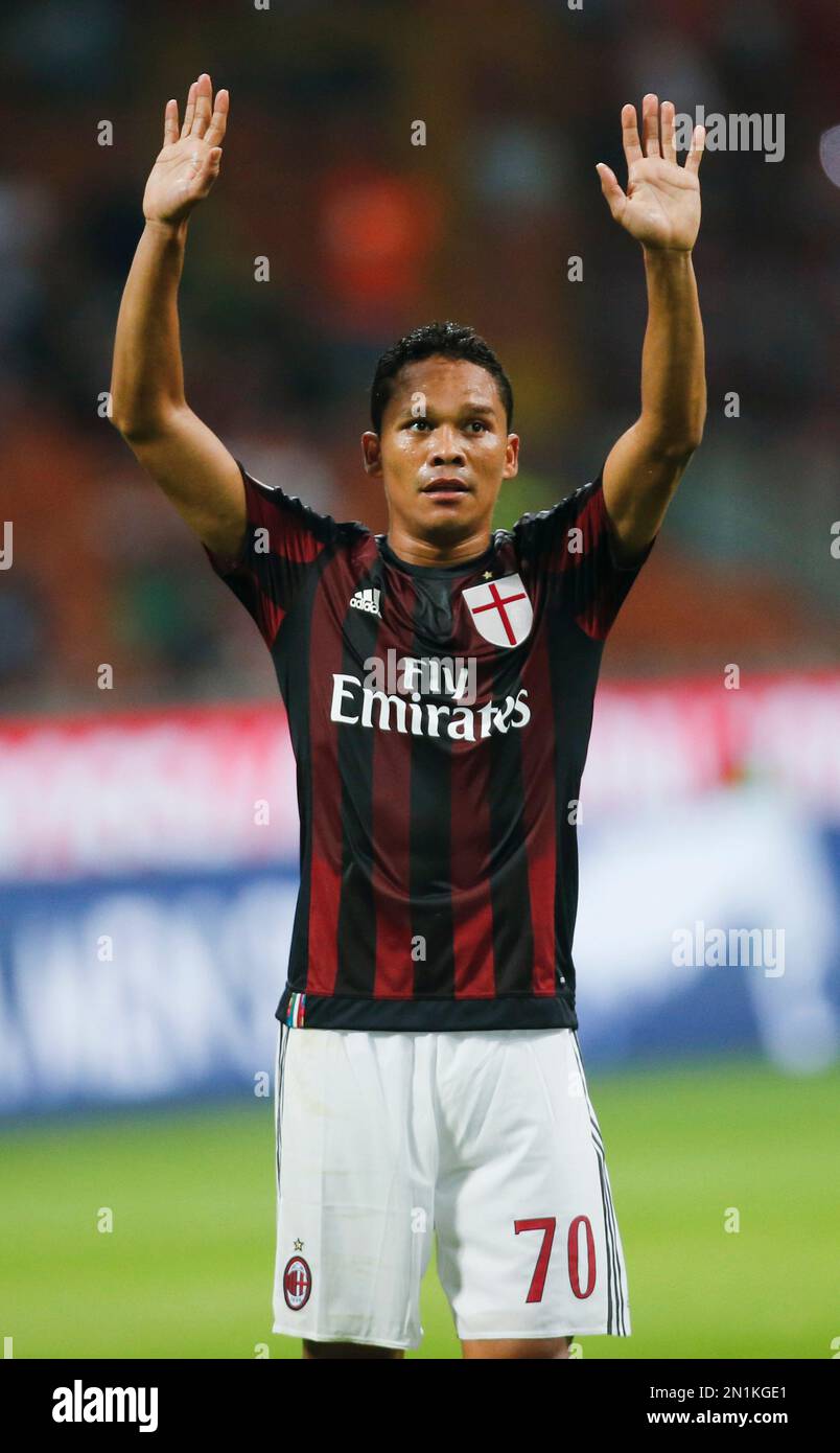 AC Milan's Carlos Bacca celebrates after scoring the opening goal during a  Serie A soccer match between AC Milan and Empoli, at the San Siro stadium  in Milan, Italy, Saturday, Aug. 29,, image size:804x1390