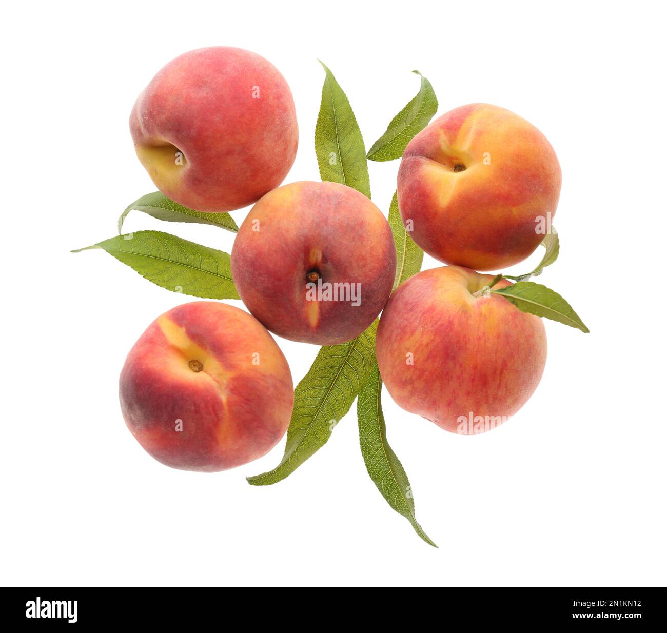 Delicious ripe juicy peaches with leaves isolated on white, top view ...
