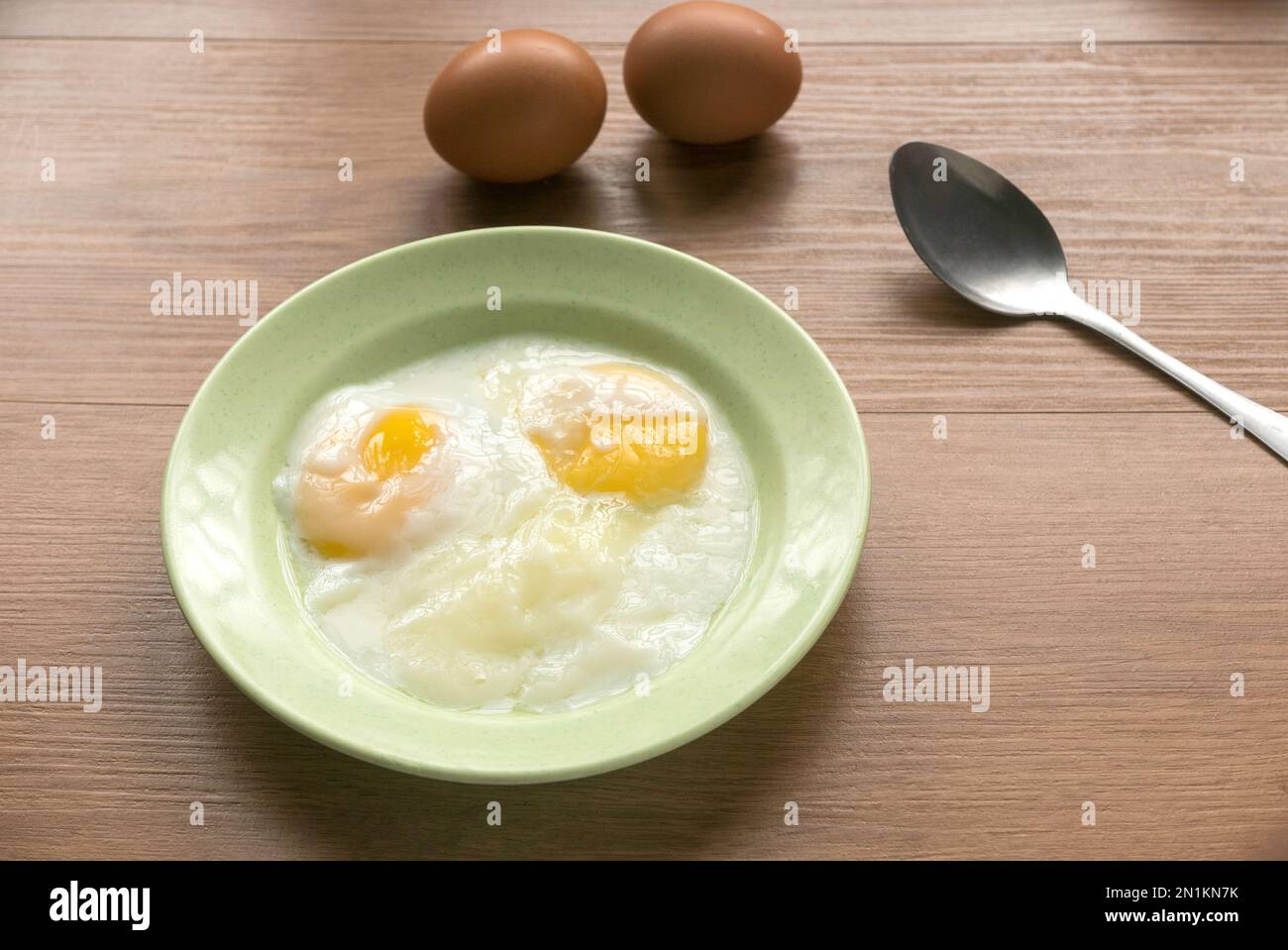 Half boiled eggs. Malaysian breakfast Stock Photo Alamy