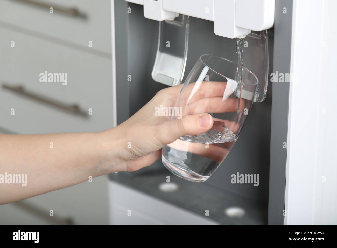 Water cooler filling water Cut Out Stock Images & Pictures - Alamy